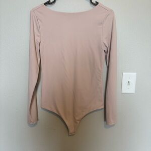 Nuuds Open Back Long Sleeve Bodysuit in Soft Pink Size Medium